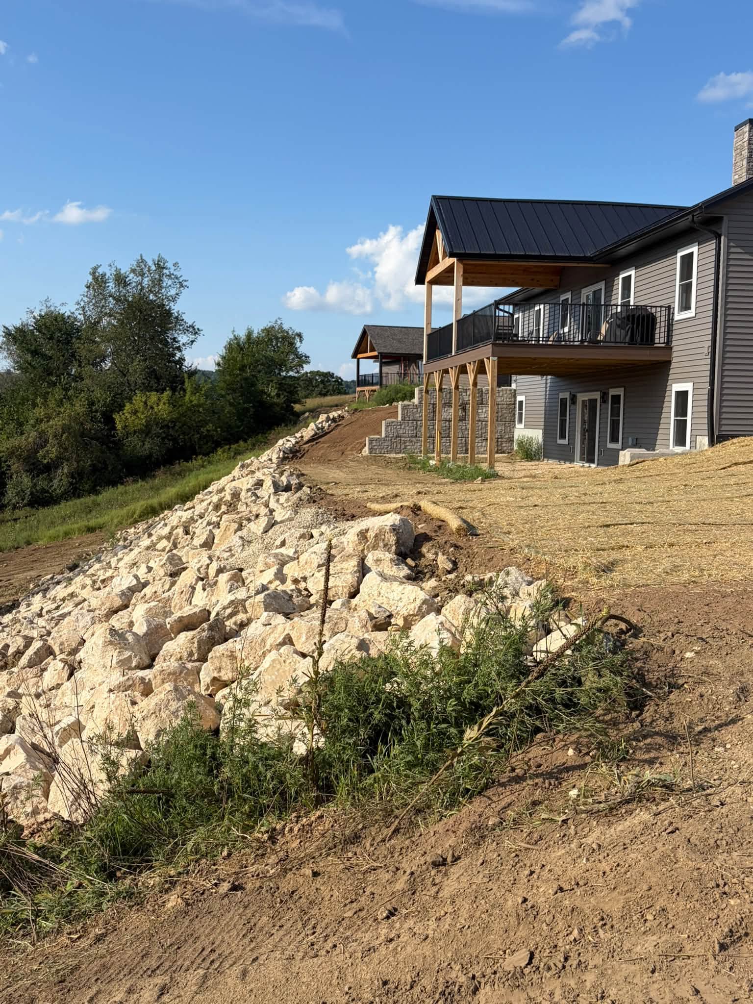 Rock embankment along a residential hillside
